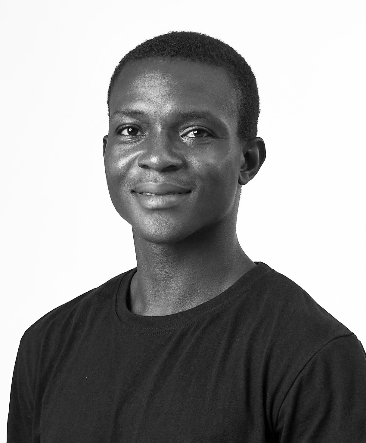 Black and white portrait of LAIDE ABIODUN as part of the Oshinowo Studio team picture