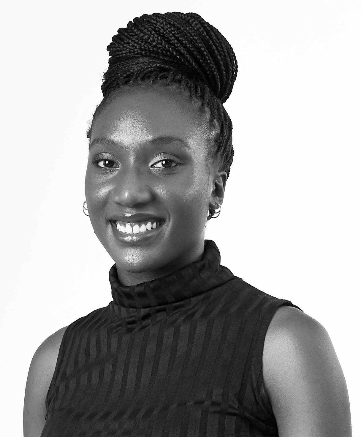Black and white portrait of NKEM MORAH as part of the Oshinowo Studio team picture