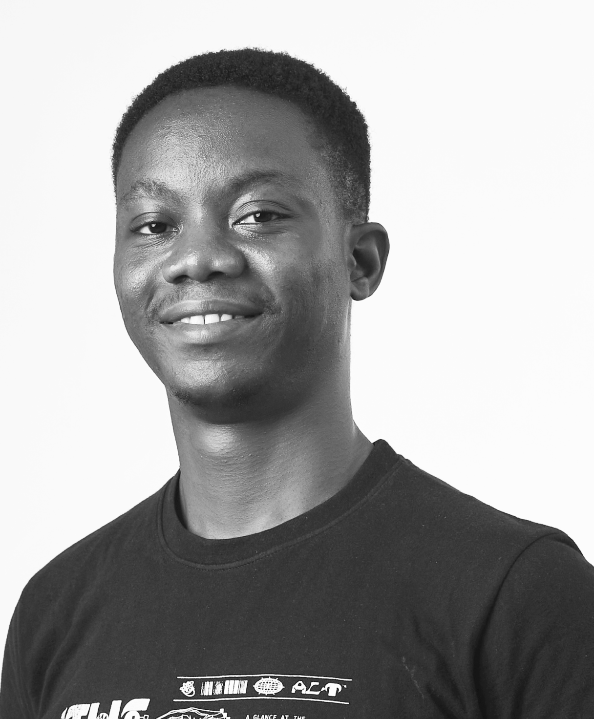 Black and white portrait of PRAISE AJANAKU as part of the Oshinowo Studio team picture
